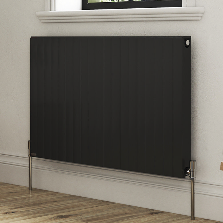 Modern black horizontal panel radiator mounted beneath a window in a contemporary room