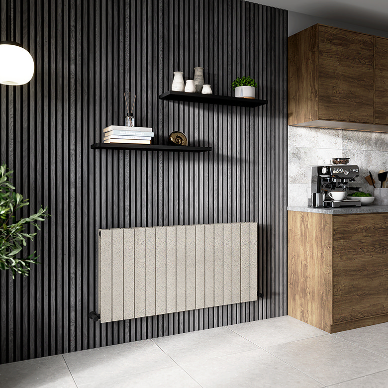Modern stone-effect horizontal radiator mounted on a black slatted wall in a contemporary kitchen