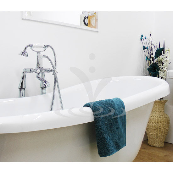 Regent Traditional Freestanding Bath Shower Mixer - Chrome - REG002SP - Close up image of chrome traditional freestanding taps next to a traditional freestanding bath