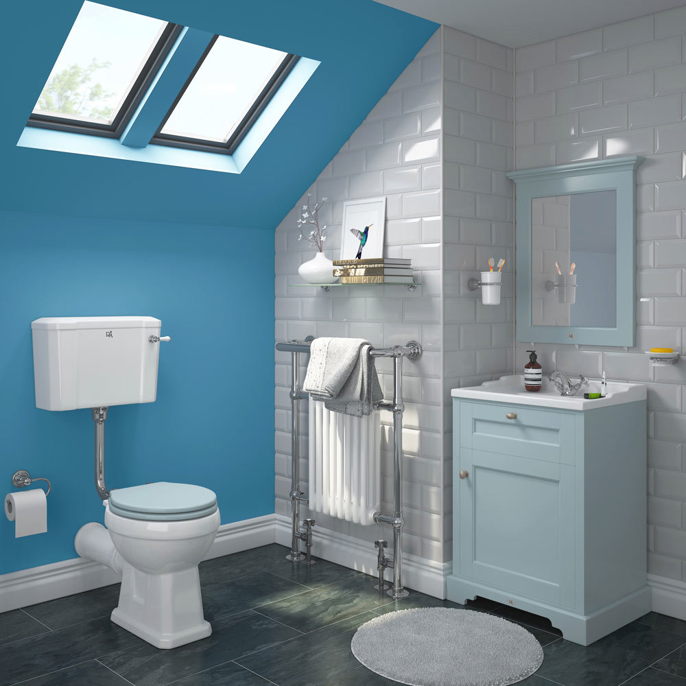 This beautiful Victorian bathroom design couples white metro tiles with a bright blue feature wall. The feature wall is complemented brilliantly by the a Downton Abbey inspired blue bathroom cabinet and blue bathroom mirror.