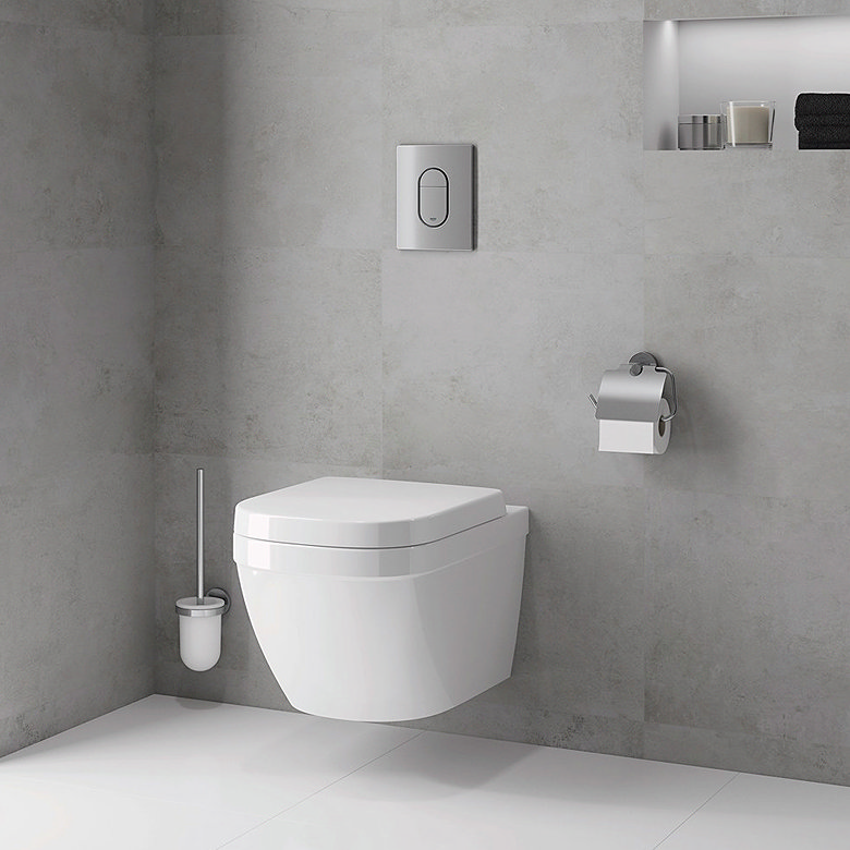 Wall hung toilet on grey tiles