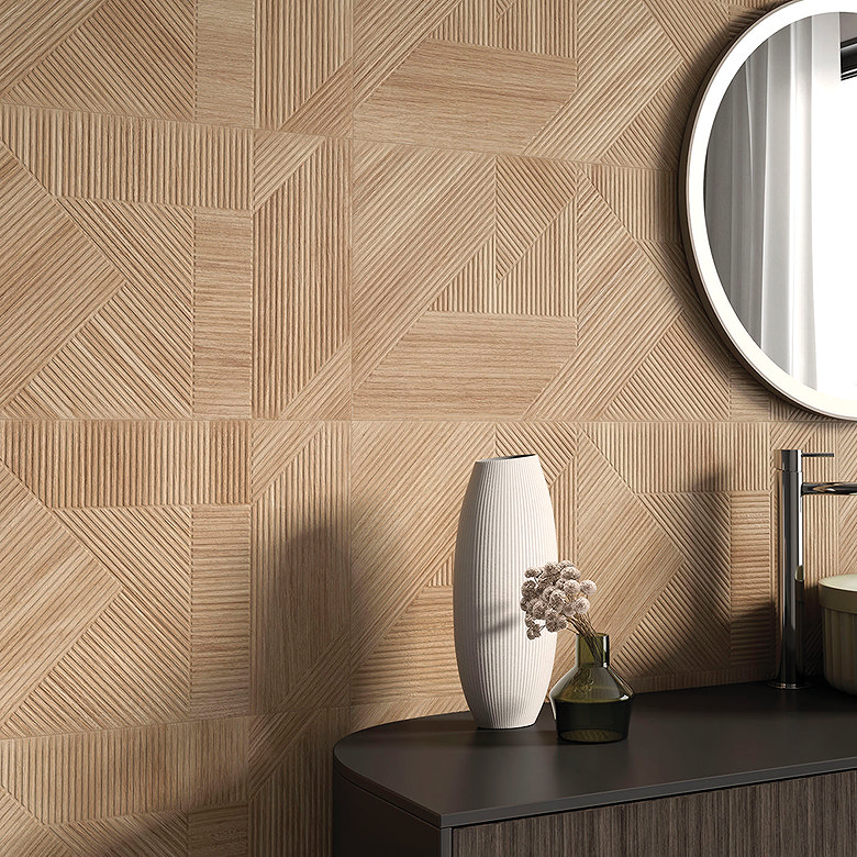 Textured geometric wall tiles creating parquet style pattern in neutral tones