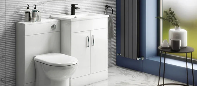 Toreno white gloss cloakroom suite with back-to-wall toilet and compact vanity unit featuring black tap and chrome handles — ideal for small, modern bathrooms.