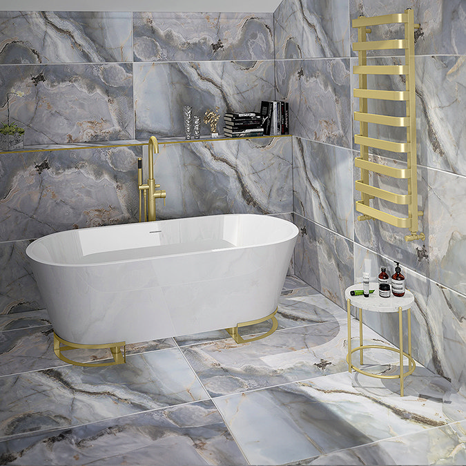 Compact bathroom side table used to store washcloths and toiletries next to the tub