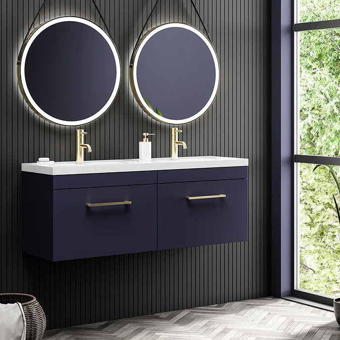 Modern Jack and Jill bathroom with double vanity and round mirrors in a sleek black design