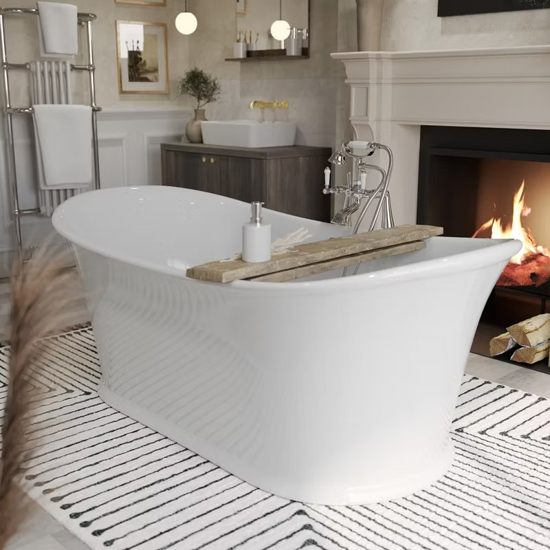 Luxurious freestanding slipper bath in a cosy Quiet Luxury bathroom featuring a fireplace, chrome towel radiator, and soft neutral tones for a serene, elegant retreat.