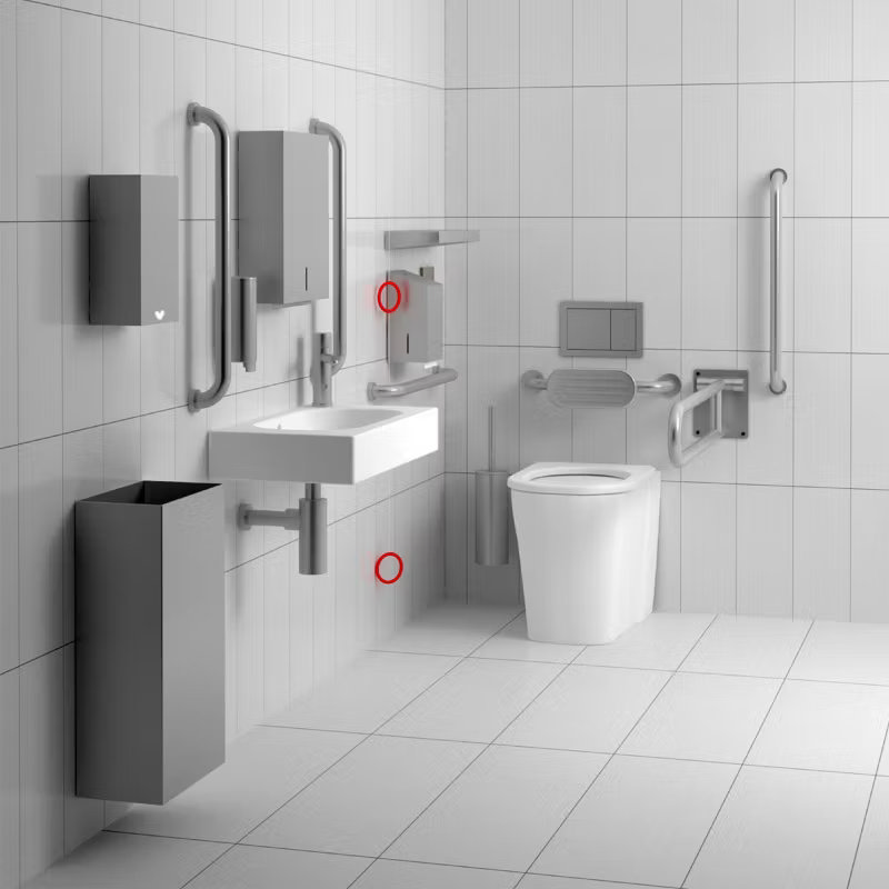 Accessible bathroom setup featuring a wall-mounted sink, grab rails, and a raised toilet. Designed for wheelchair users with safety bars and ample space for mobility.