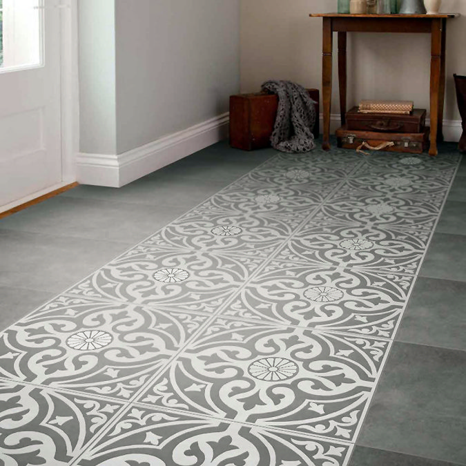 Intricate grey and white patterned floor tiles with a Victorian-inspired design, creating an elegant and vintage hallway runner effect.