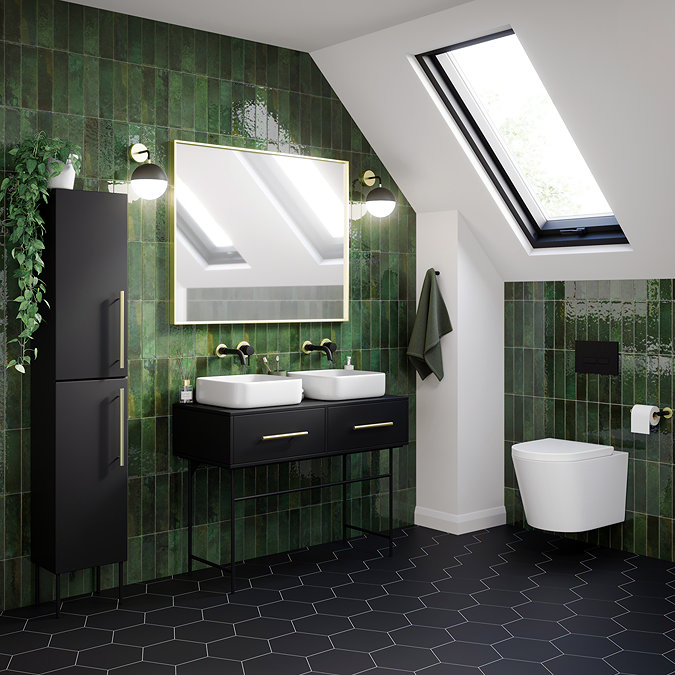 Small bathroom with deep green glossy wall tiles in the shower area, paired with black fittings for a bold modern look