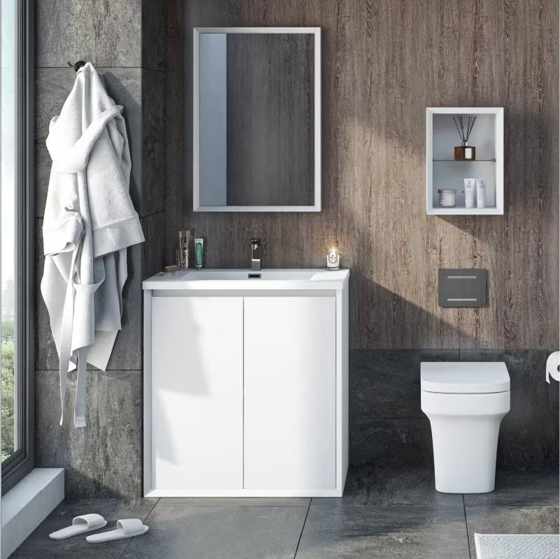 Modern bathroom with a sleek white vanity unit, wall-mounted toilet, and wood-panelled feature wall, highlighting minimalist design on a budget.