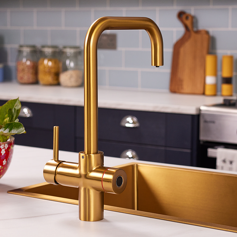 Brushed gold instant boiling water tap