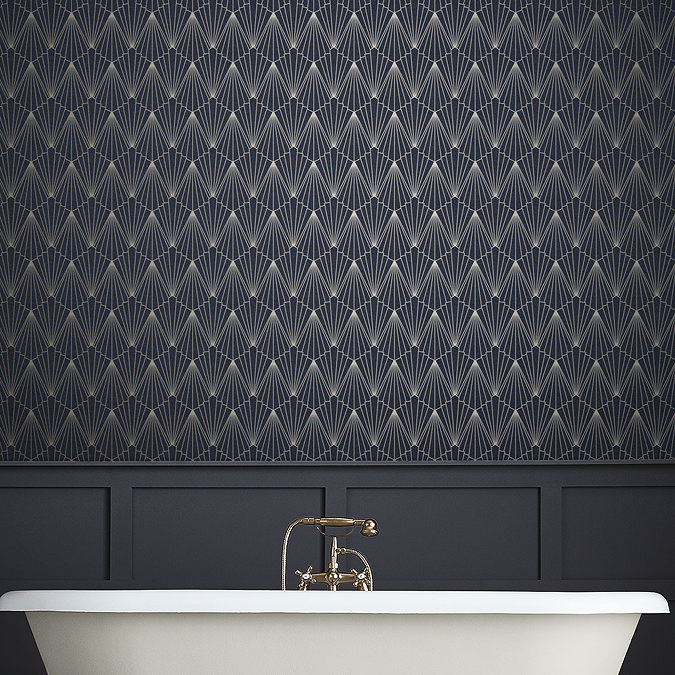 Luxury bathroom featuring bold dark wallpaper with intricate gold geometric patterns, complemented by a white freestanding bathtub and vintage gold taps.