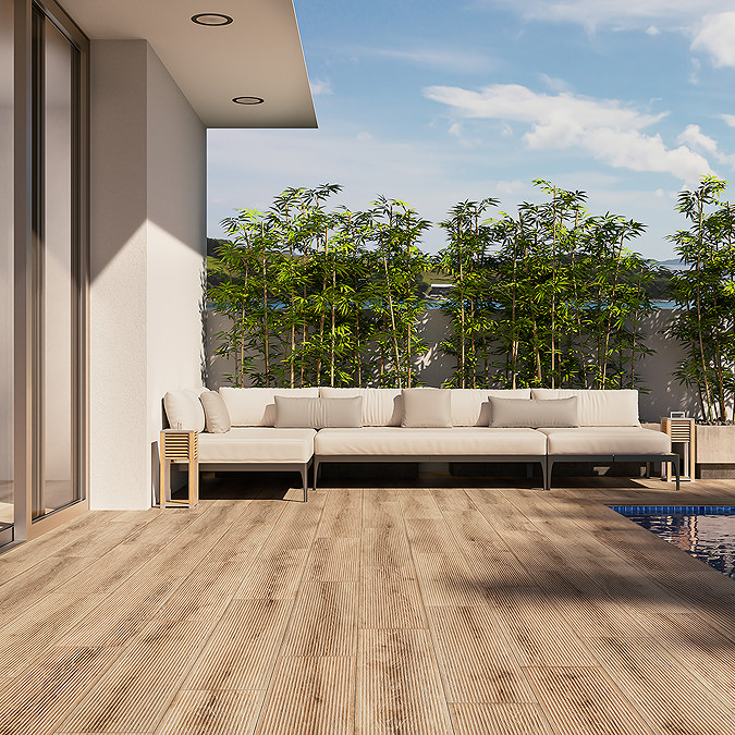 Fallowfield Natural Oak wood-effect porcelain patio tiles creating a low-maintenance decking look