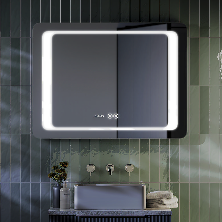 Illuminated heated bathroom mirror with LED light frame and anti-fog demister above basin