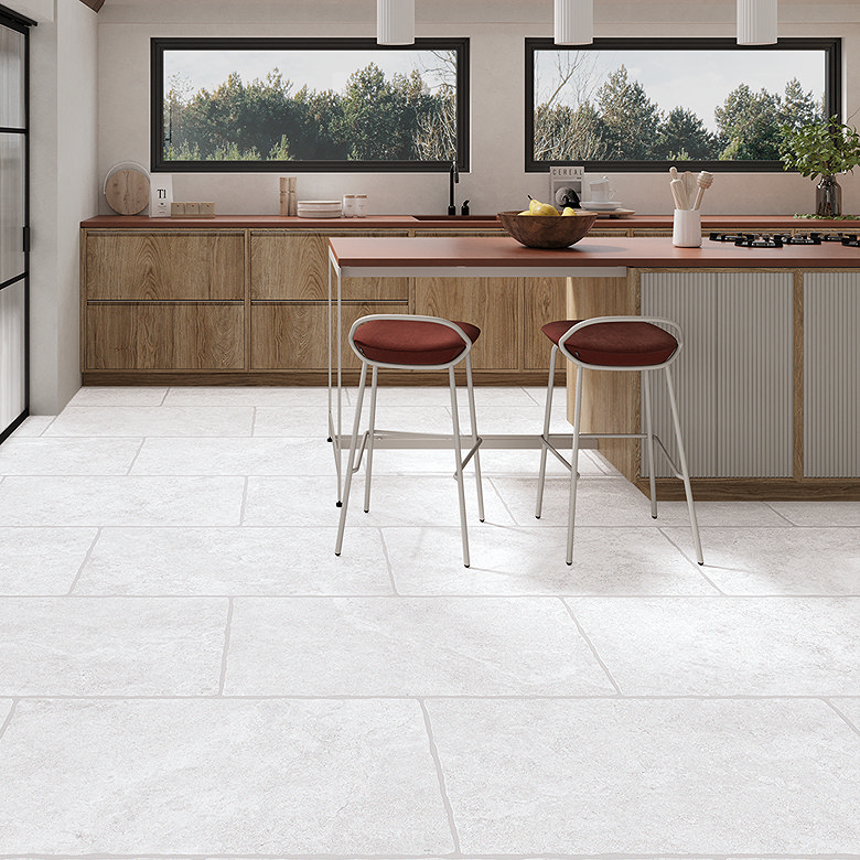 Large format white stone effect kitchen floor tiles