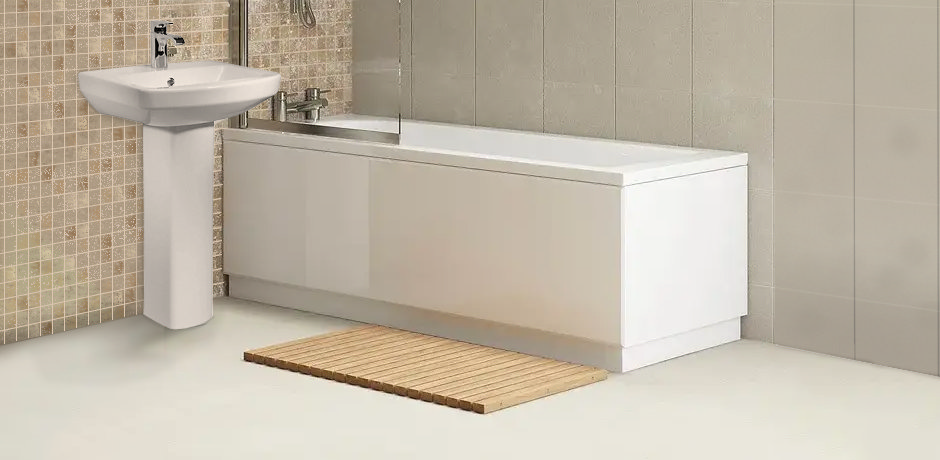 Modern bathroom with an acrylic bath panel installed, complementing a pedestal sink and neutral tile walls for a clean, minimalist look.