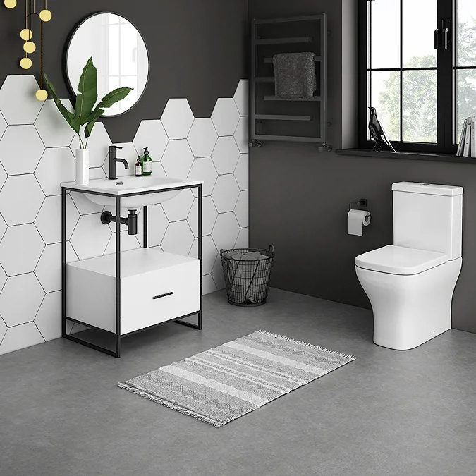 Modern bathroom with black and wood-effect Venice furniture, white bath, and shower screen, available at Victorian Plumbing