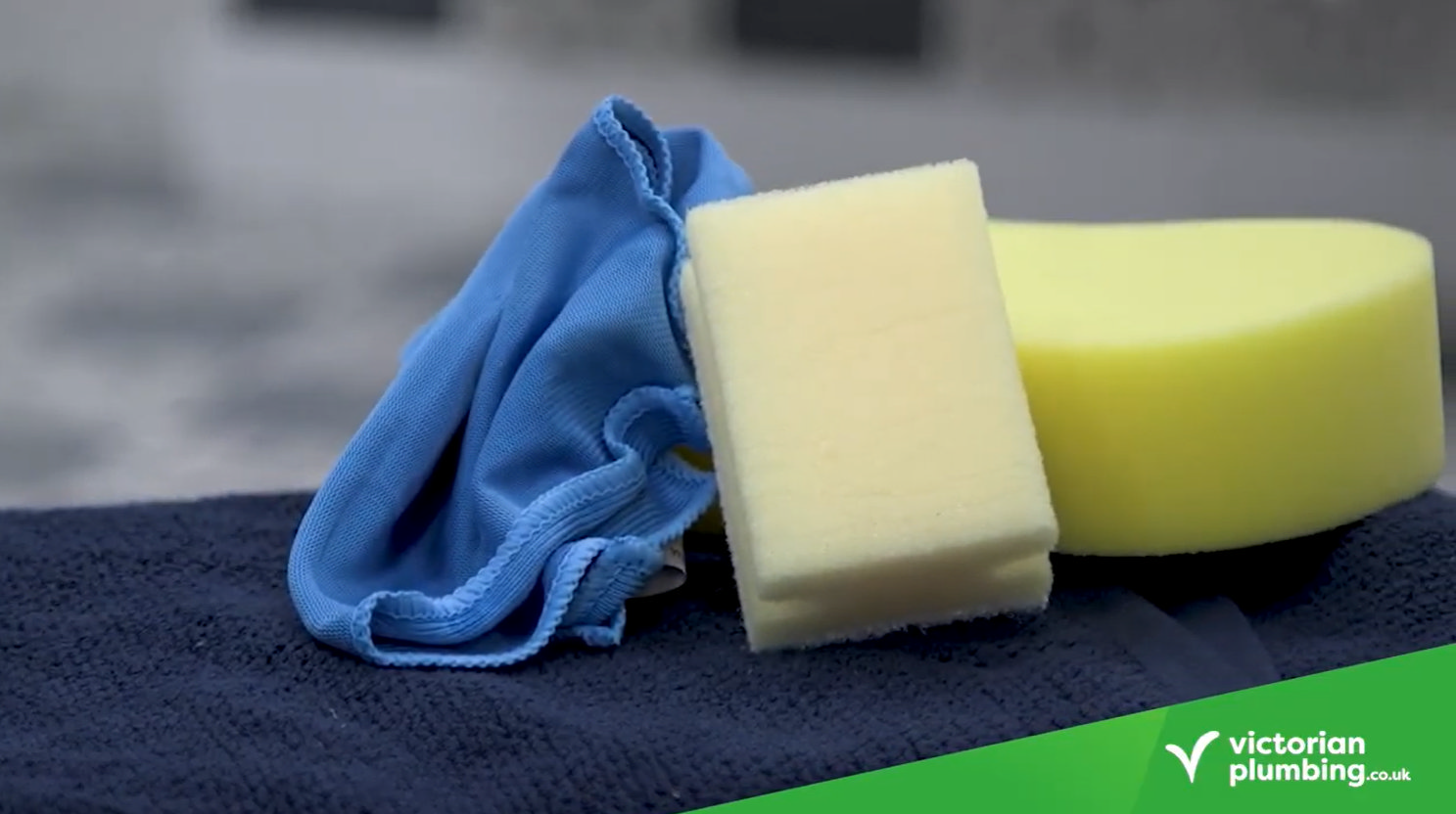 Soft cleaning cloth and non-abrasive sponges for safely maintaining bathroom wall panels without scratching or damage.