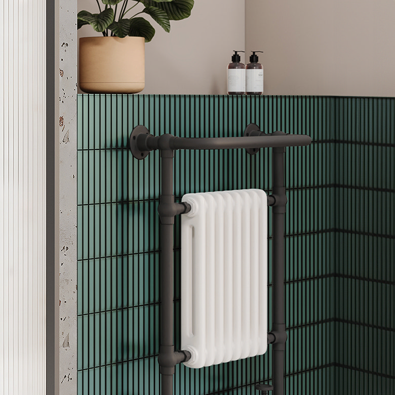 Half tiled bathroom with bright kit kat tiles at half height and black fixtures