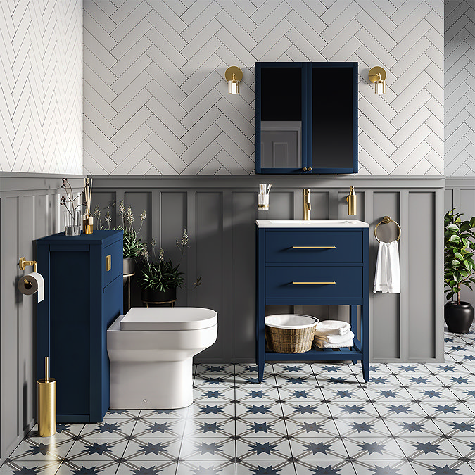 Stylish cloakroom with blue vanity unit, back-to-wall WC toilet and patterned floor tiles