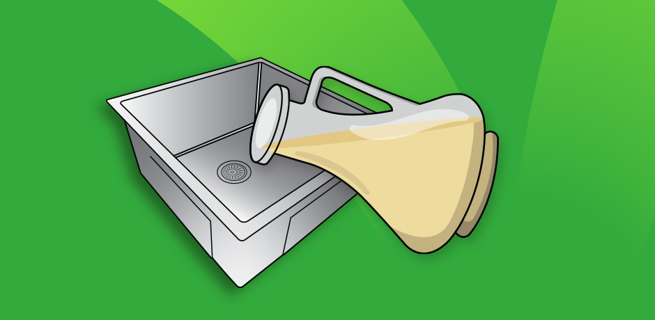 Pouring vinegar into a stainless steel sink to remove water spots