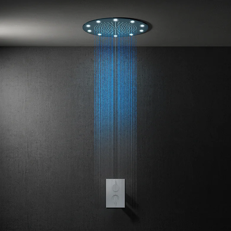 LED showerhead displaying six colour variations: red, blue, pink, green, multicolour, and purple, creating a vibrant and modern bathroom atmosphere against dark tiled walls.