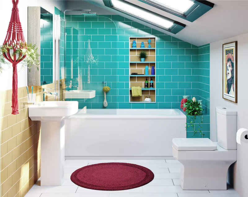 Vibrant bathroom with bold teal subway tiles, a white bathtub, and skylight. Features a red round rug, macramé hanging plant, and built-in shelving for a colourful, retro-inspired space.