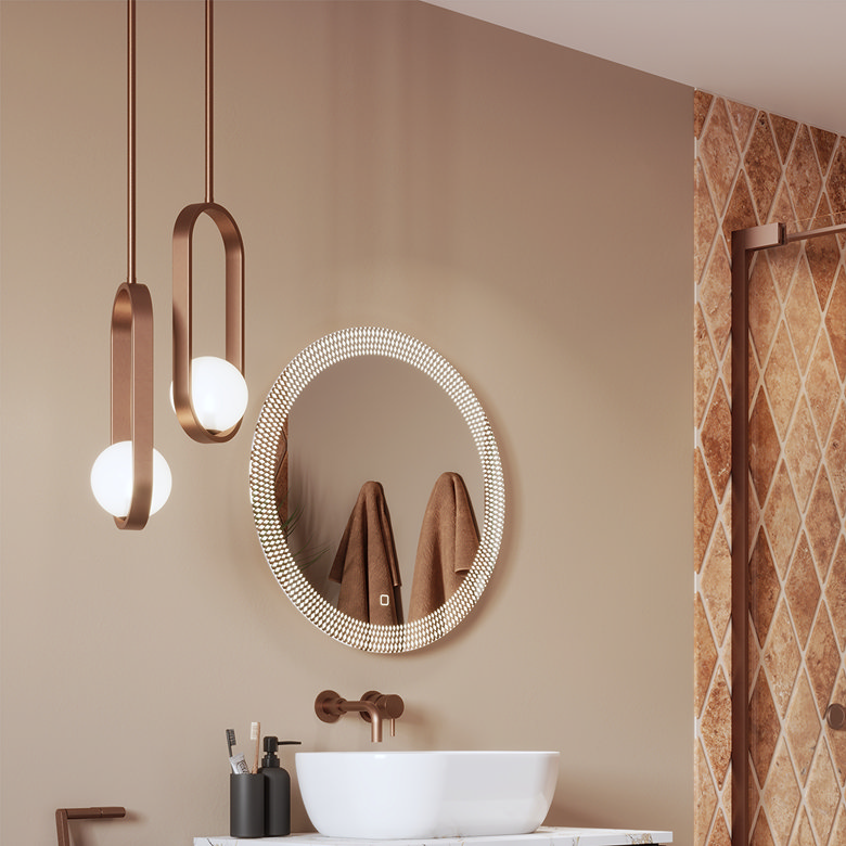 Elegant bathroom with a copper-toned oval wall light, a matching round illuminated mirror, and a copper vessel sink with a minimalist wall-mounted tap, complemented by white subway tiles.