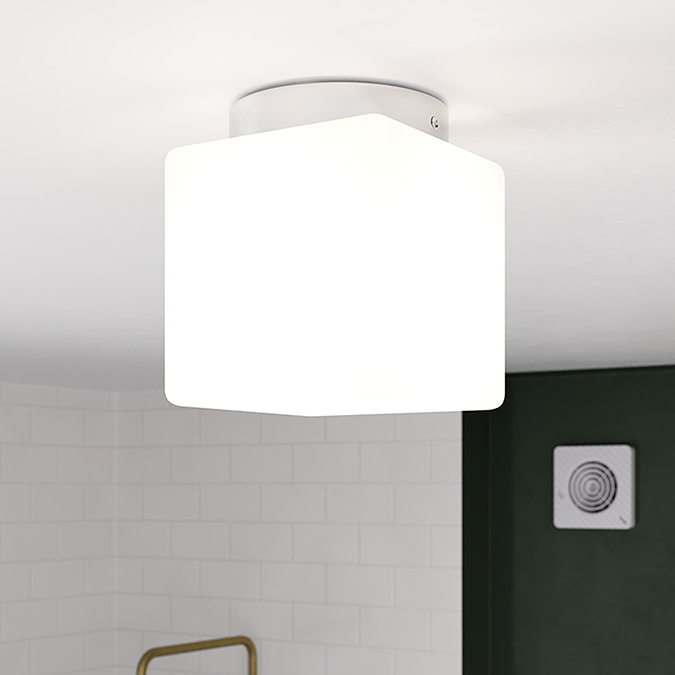 Square-shaped frosted glass ceiling light with a minimalist chrome base, providing soft and even illumination in a modern bathroom setting.