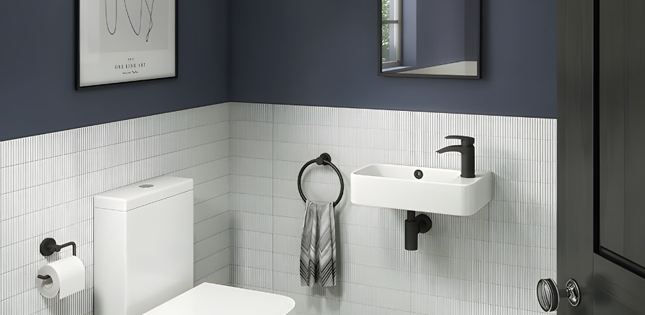 Small modern cloakroom with a slim wall-hung basin and black mono tap.