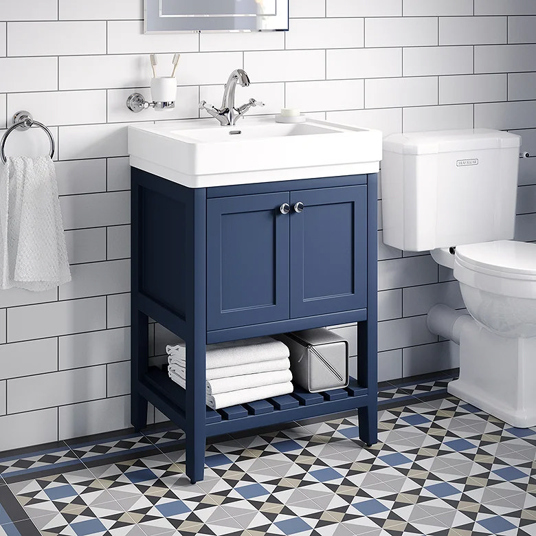 Blue and grey geometric bathroom floor tiles.