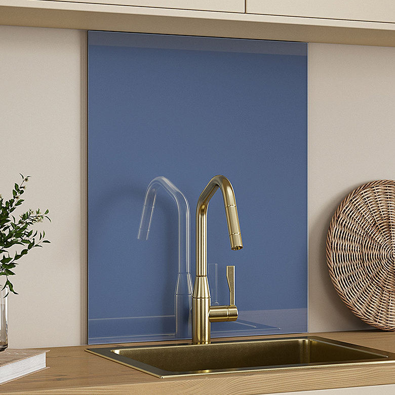 colourful blue glass kitchen splashback behind sink