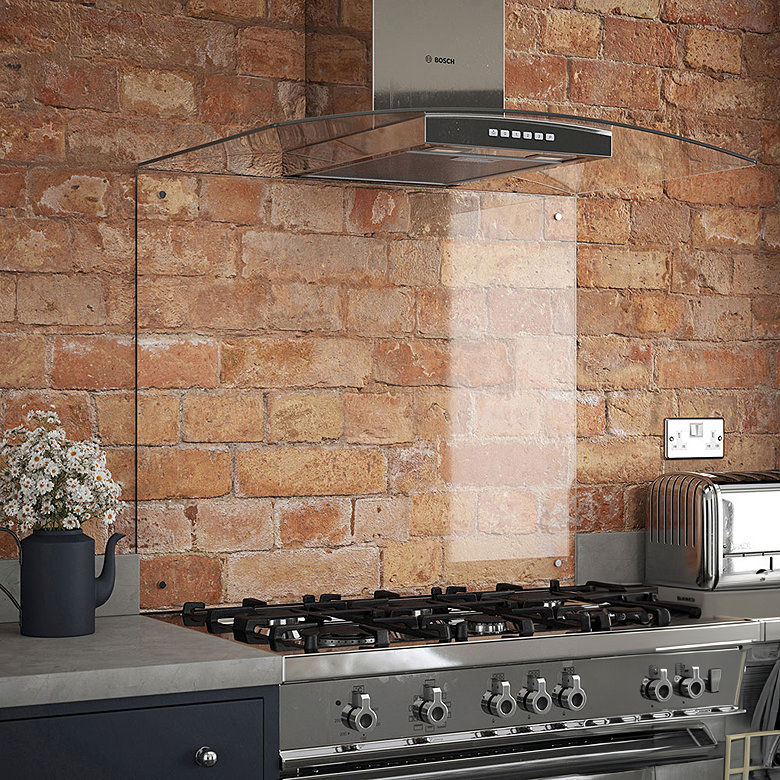clear glass kitchen splashback behind hob