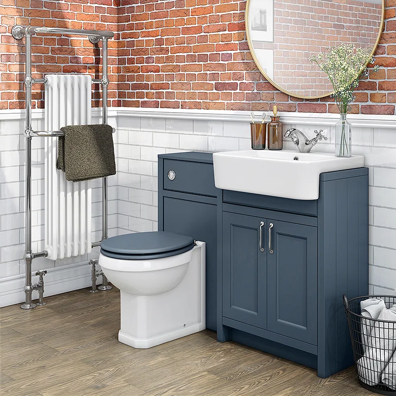 Blue bathroom furniture set with vanity unit, toilet unit and built-in cupboard storage