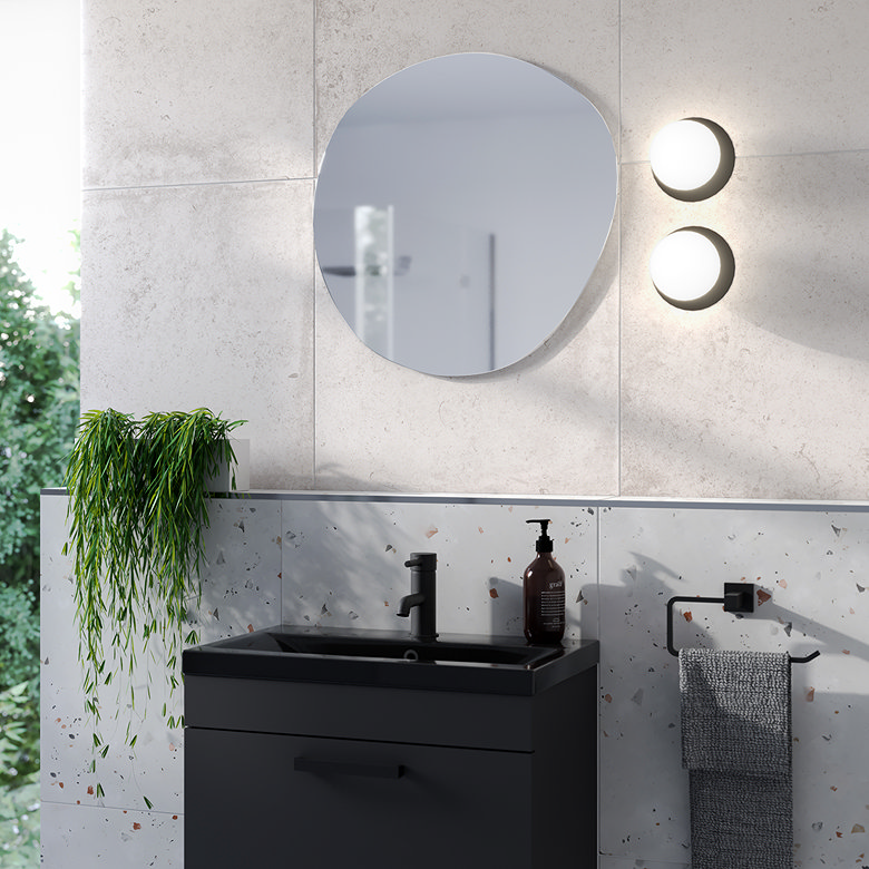 natural shape wall mirror in bathroom
