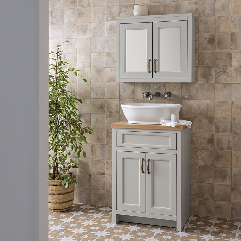 traditional wooden vanity in boho bathroom