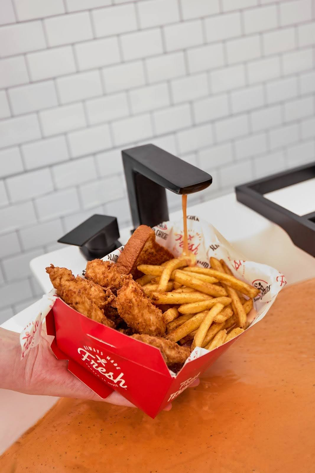 chicken takeaway under dip tap in bathroom