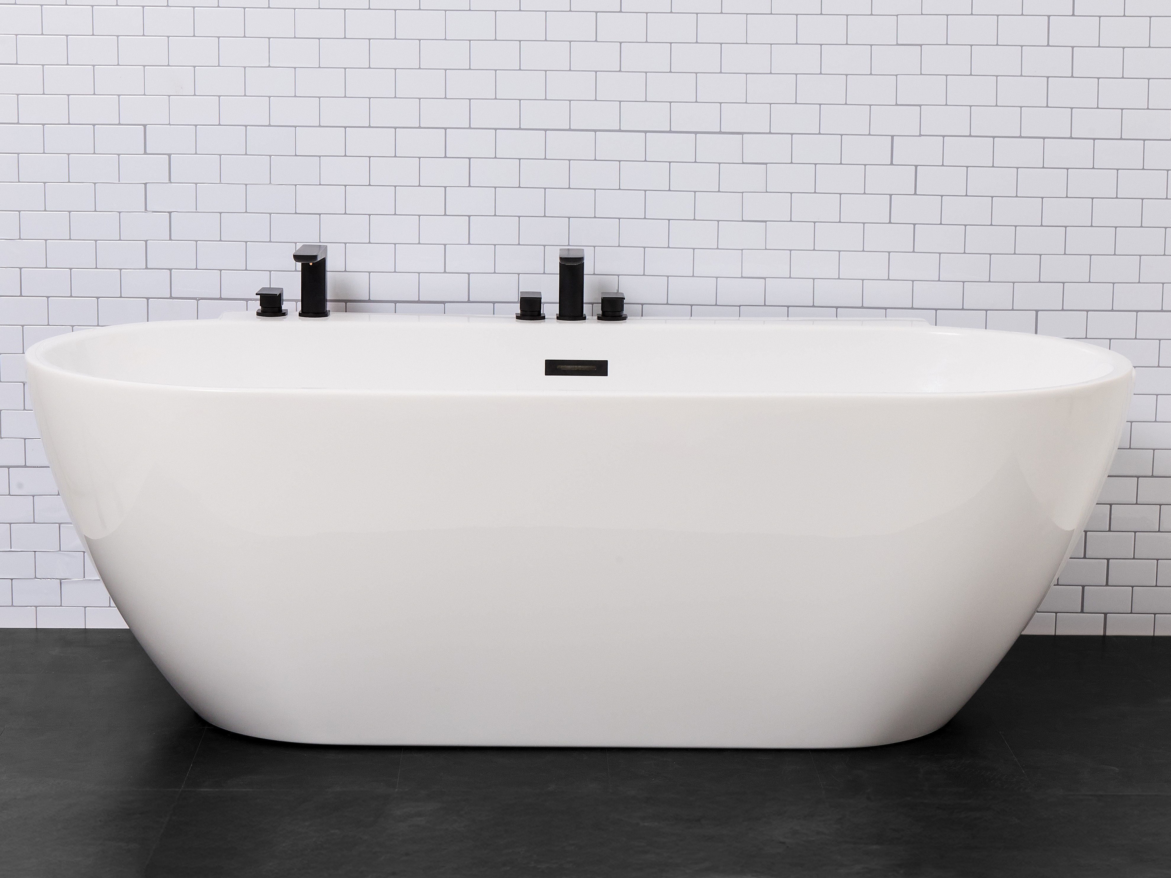 modern white freestanding bath in bathroom