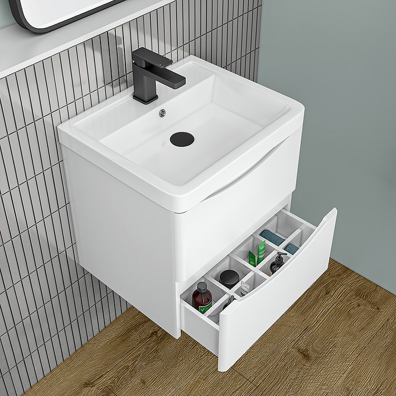 white sink and open drawer with organiser