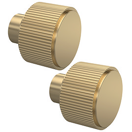 Two Arezzo Fluted Knob Handle Brushed Brass pictured at angle on a white background.