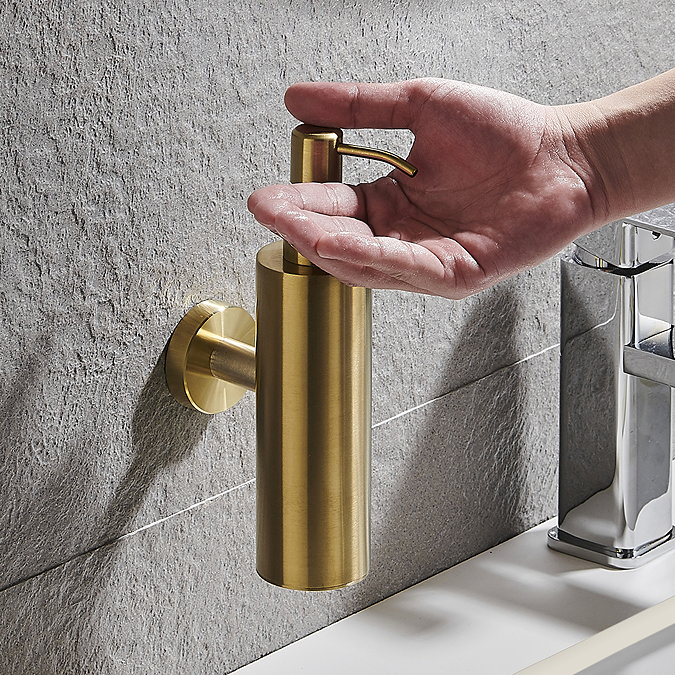 Arezzo Brushed Brass Round Wall Mounted Soap Dispenser  In Bathroom Large Image