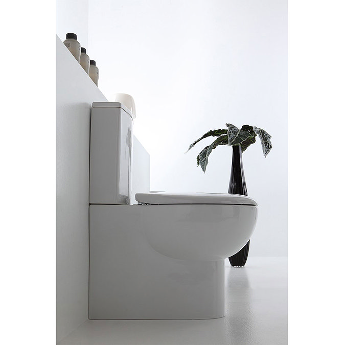 Bauhaus - Wisp Close Coupled Toilet with Soft Close Seat In Bathroom Large Image