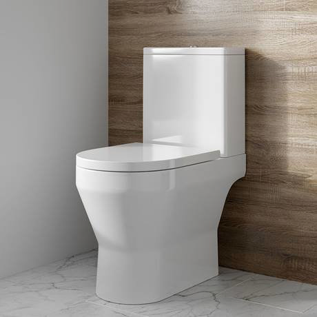 Britton Curve2 Rimless Close Coupled Open Back Toilet with Brushed Brass Flush Button + Soft Close S