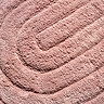 Close up image of the peaks of the arched design on the Croydex Pink Arched Bath Mat, also showing the tufted surface in greater detail.