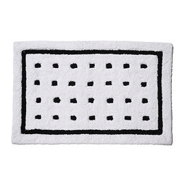 Top-down view of the Croydex White and Black Squares Bath Mat showing the white mat with black box around the perimeter and 28 squares spaced out in lines within the black box, pictured on a white background.