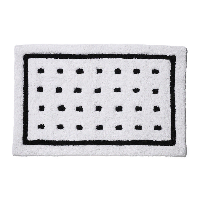 Top-down view of the Croydex White and Black Squares Bath Mat showing the white mat with black box around the perimeter and 28 squares spaced out in lines within the black box, pictured on a white background.
