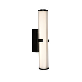 A matt black clamp‑style wall light with a glowing ribbed opal glass tube held in place by a central black metal clamp.