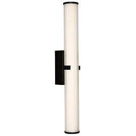A matt black clamp‑style wall light with a glowing ribbed opal glass tube held in place by a central black metal clamp.