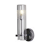 A chrome bathroom wall light with a cylindrical clear glass shade featuring a frosted etched pattern near the top, shown illuminated.