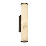 A tall wall light with a glowing marble‑effect cylindrical diffuser mounted on a black rectangular backplate.